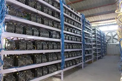 An expansive Bitcoin mining farm showing rows of machines